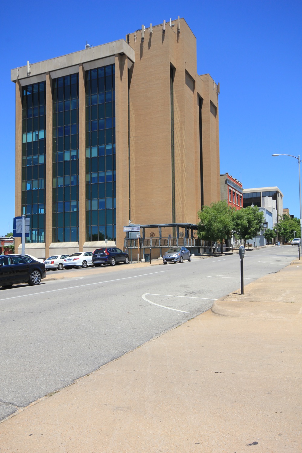 112 W Center before renovation, a seven story brick and glass building