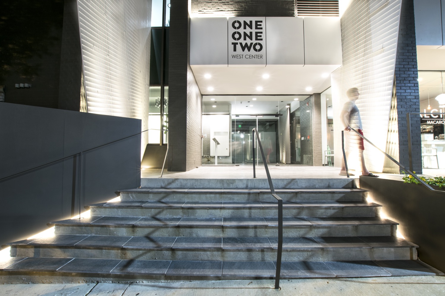 Night-view-of-stairs-and-front-entry-at-112-W-Center