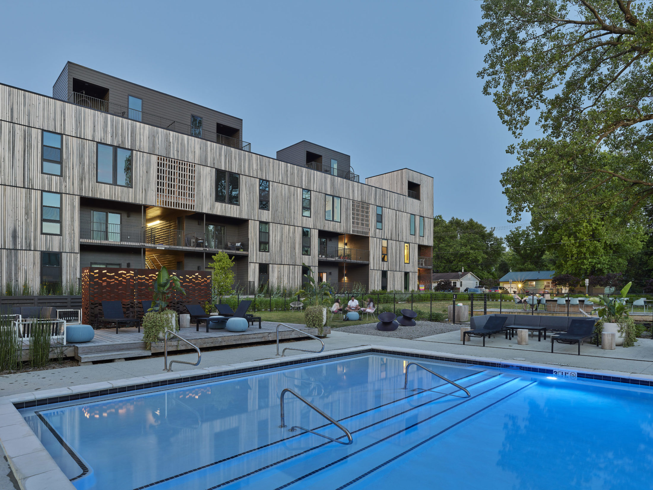 Modern cypress and brick apartment building